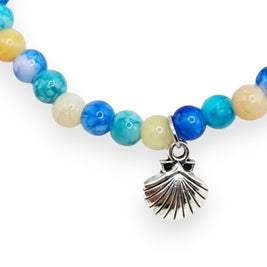 Handmade by Erika Liesel Ocean Breeze elastic bracelet with aqua, blue, and cream glass beads and a silver seashell charm