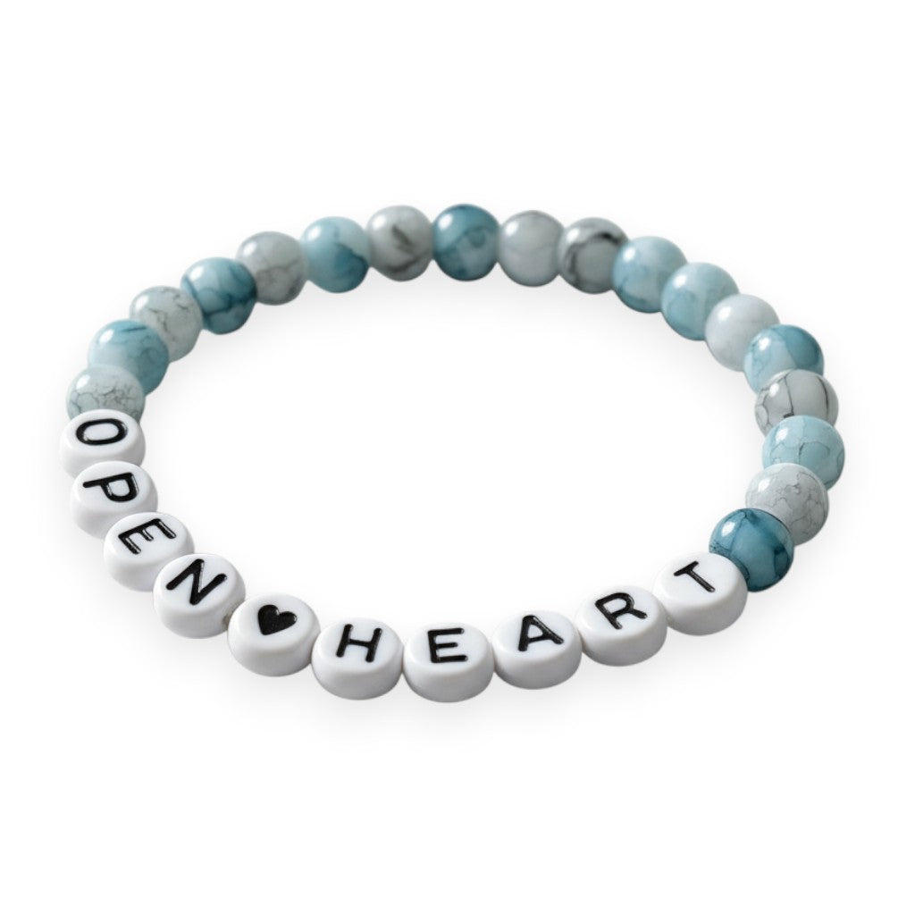 Handmade by Erika Liesel stretch bracelet with blue marbled glass beads and white letter beads spelling Open Heart.