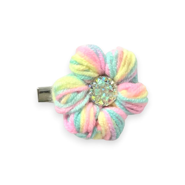Pastel rainbow crochet flower hair clip with sparkly center, handmade cozy accessory