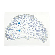 Handmade by Erika Liesel peacock card featuring a blue line art illustration with sparkling gem accents on white card