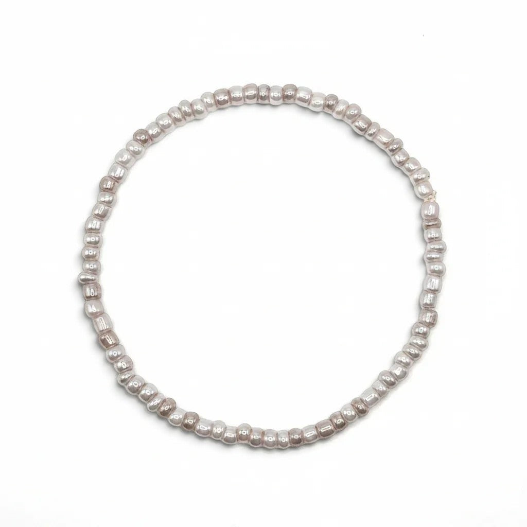 Handmade by Erika Liesel pearl gray stretch bracelet featuring delicate 3mm glass beads with a luminous finish.