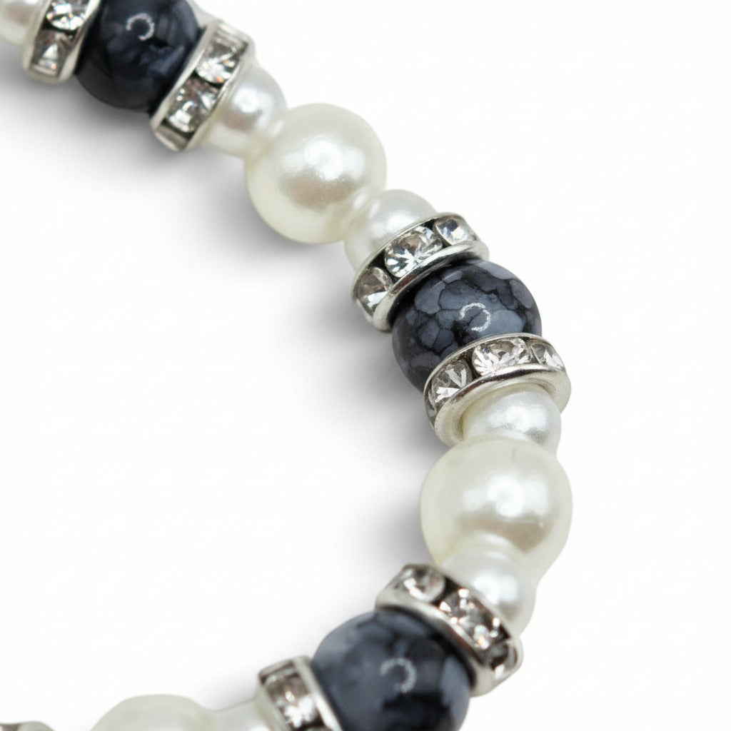 Handmade by Erika Liesel Pearl Noir stretch bracelet with faux pearls, black marbled glass beads, and rhinestone spacers