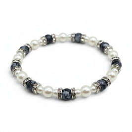 Handmade by Erika Liesel Pearl Noir stretch bracelet featuring faux pearls, black marbled glass, and rhinestone beads.