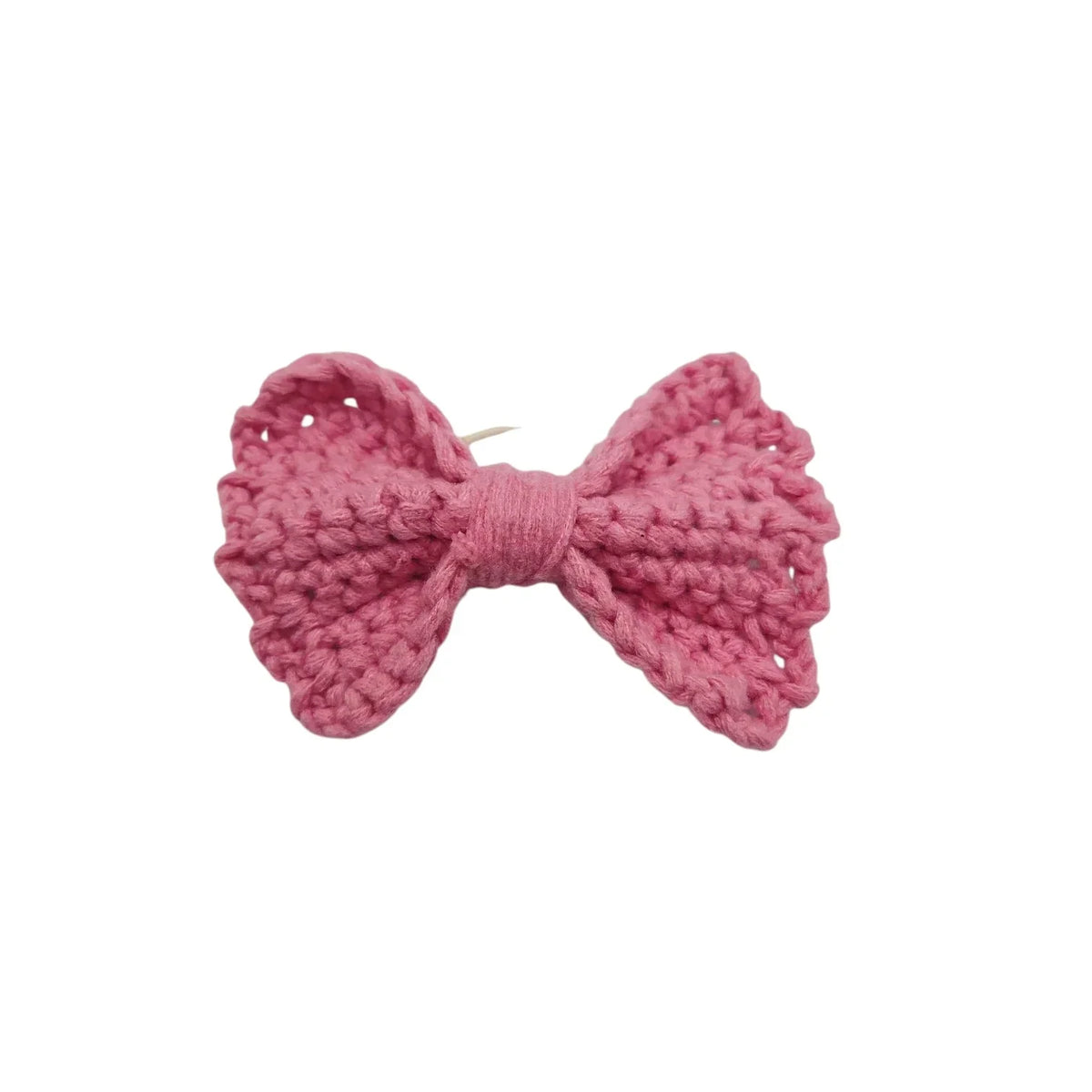 Handmade by Erika Liesel pink crochet bow hair tie with a soft, textured yarn finish and durable elastic band.