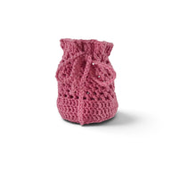 Handmade by Erika Liesel pink crochet drawstring bag made from soft premium yarn for jewelry or gift storage.