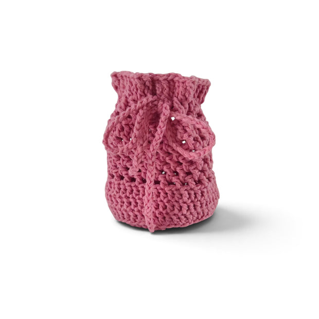 Handmade by Erika Liesel pink crochet drawstring bag made from soft premium yarn for jewelry or gift storage.