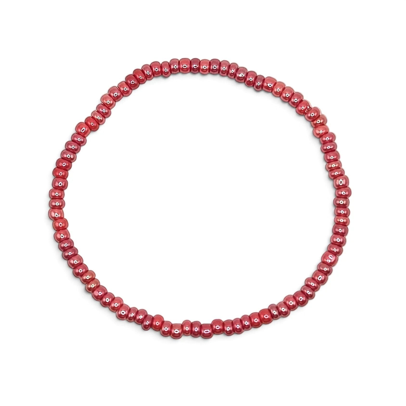 Handmade by Erika Liesel stretch bracelet featuring glossy pink 3mm glass beads on a durable elastic cord.