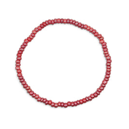 Handmade by Erika Liesel stretch bracelet featuring glossy pink 3mm glass beads on a durable elastic cord.