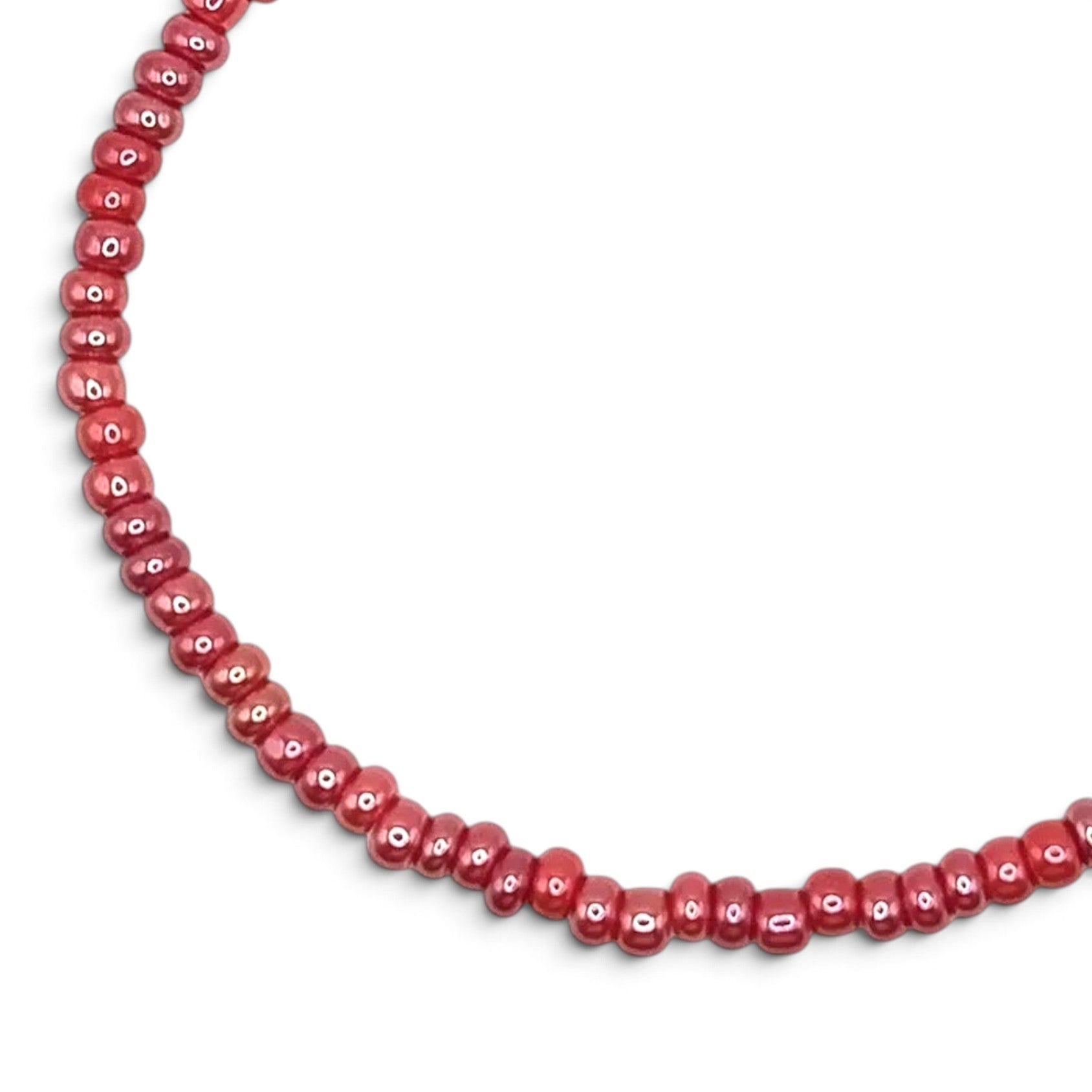 Handmade by Erika Liesel pink stretch bracelet featuring 3mm glossy glass beads on a durable elastic cord