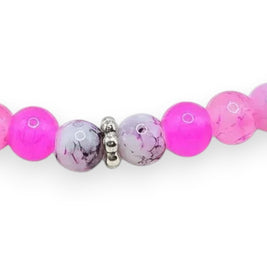 Handmade by Erika Liesel Pink Petal Bracelet featuring blush, bubblegum, and marbled pink glass beads with silver spacers