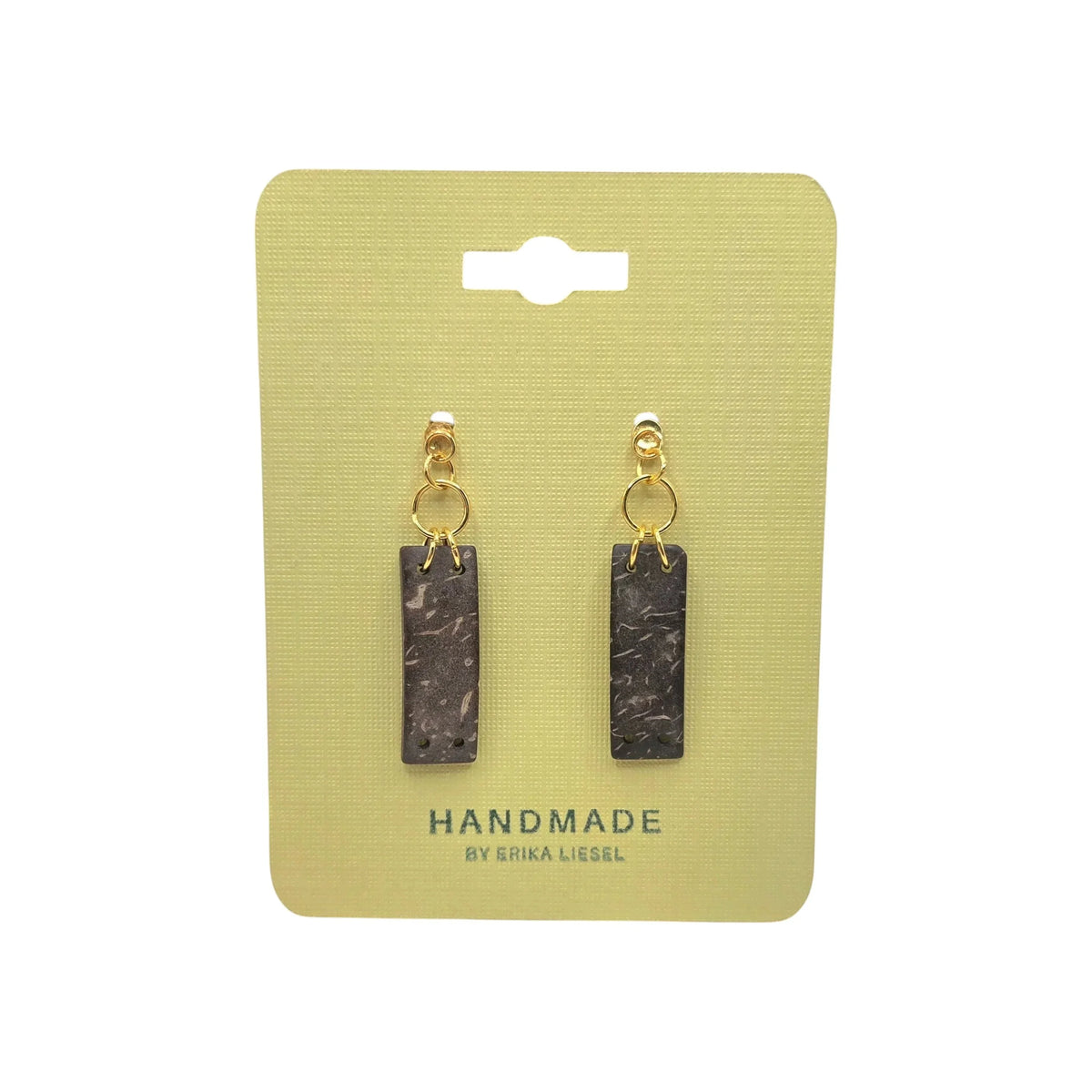 Handmade coconut shell earrings with gold hoops on yellow card, eco-friendly sustainable jewelry