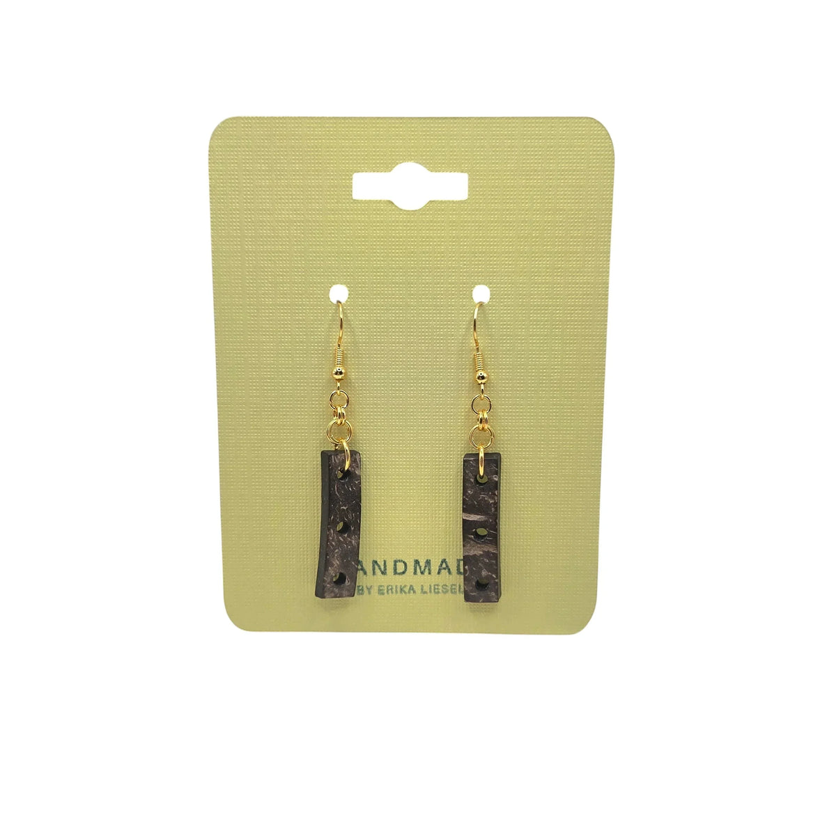 Handmade coconut shell earrings with gold hooks on pale yellow card, eco-friendly boho jewelry