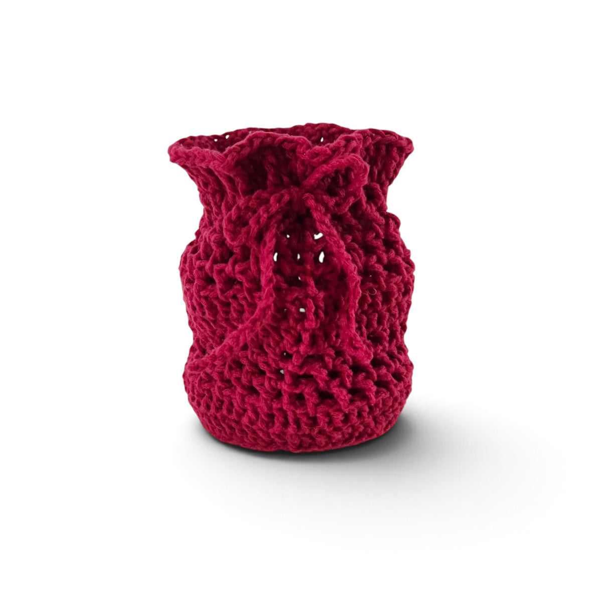 Handmade by Erika Liesel deep red crochet drawstring bag made from soft premium yarn for gift wrapping or storage.