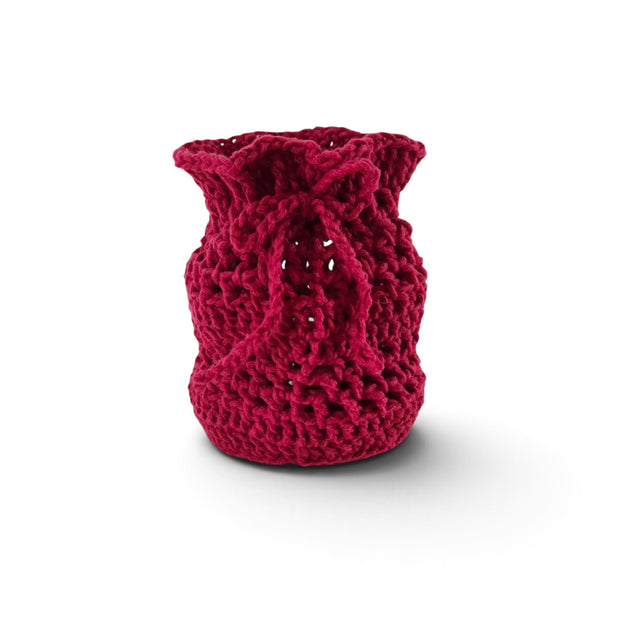 Handmade by Erika Liesel deep red crochet drawstring bag made from soft premium yarn for gift wrapping or storage.