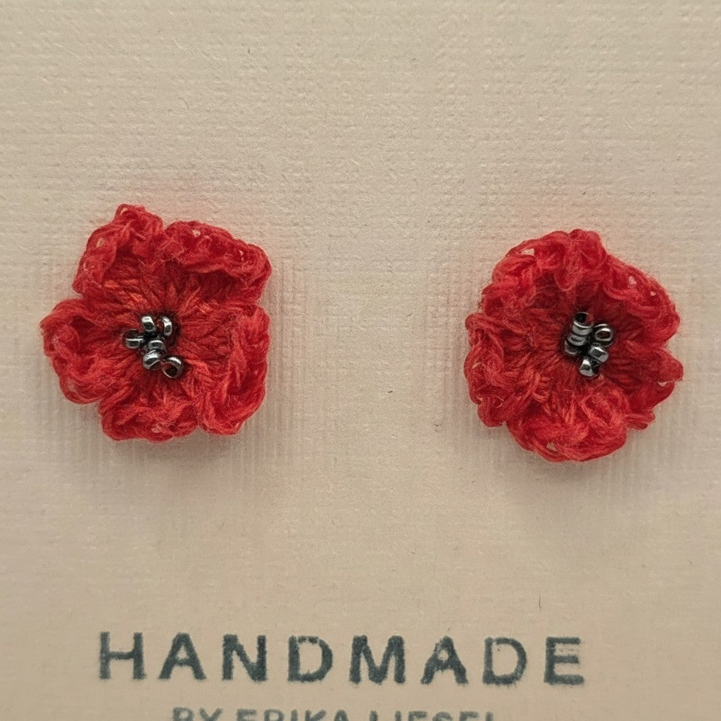 Handmade by Erika Liesel scarlet red crochet flower stud earrings with delicate glass bead centers.