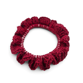 Handmade by Erika Liesel Luxe Touch deep red crochet scrunchie with a soft, textured ruffled design.