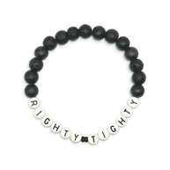 Handmade by Erika Liesel Righty Tighty men's bracelet featuring 8mm matte black lava stone and white letter beads.