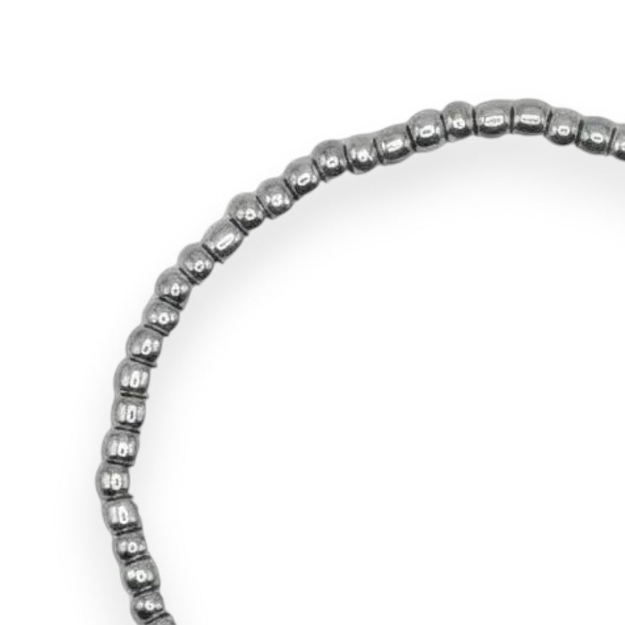 Handmade by Erika Liesel silver-toned stretch bracelet featuring 3mm glass beads on a durable elastic cord.