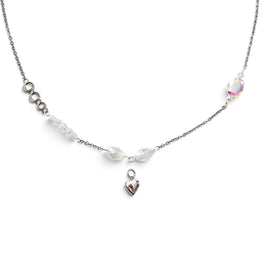 Handmade by Erika Liesel silver layering necklace with iridescent crystal glass accents and a small heart charm.