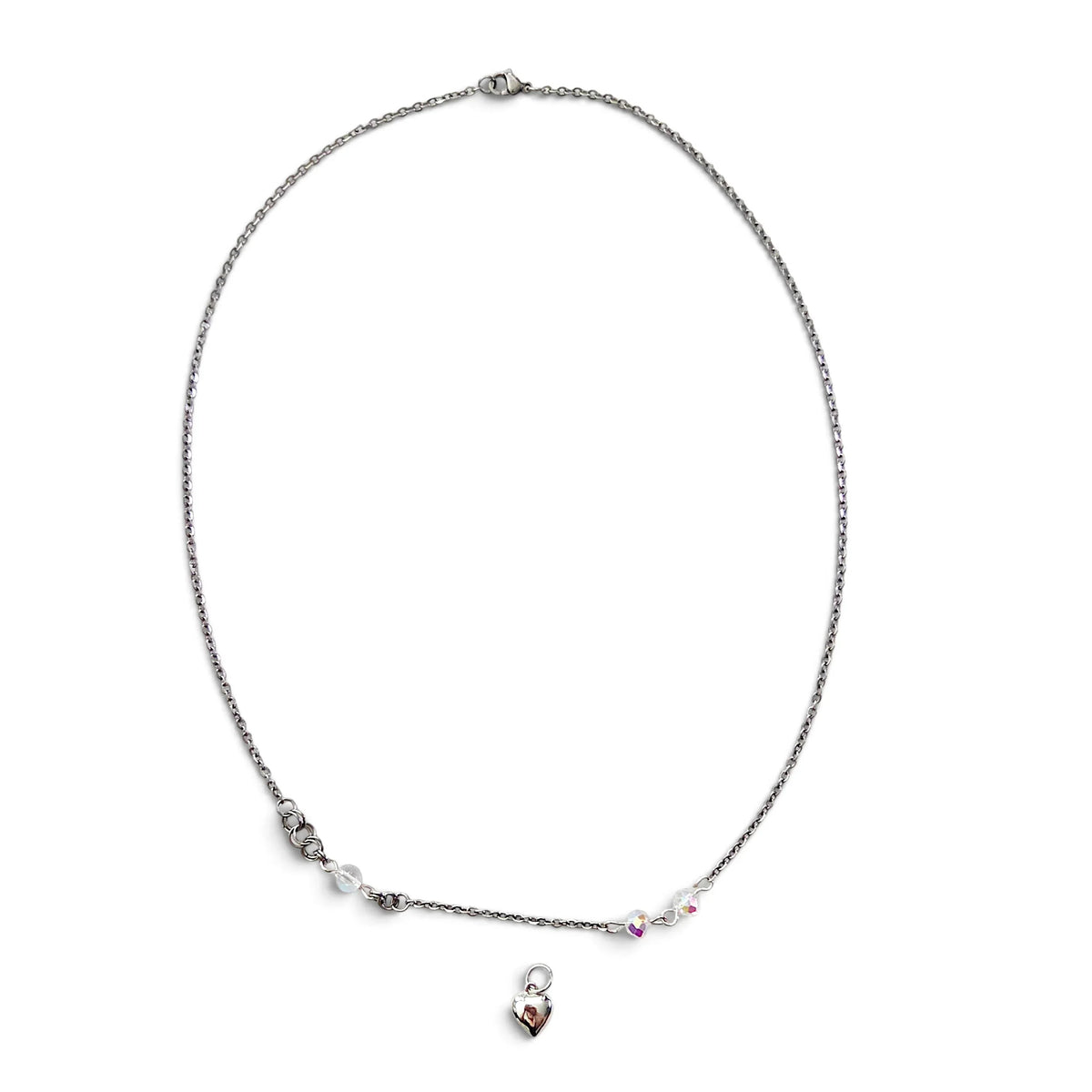 Handmade by Erika Liesel 20-inch silver-tone chain necklace with crystal glass accents and a removable heart charm.