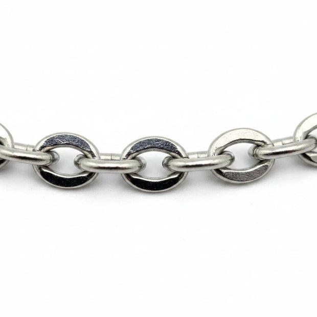 Handmade by Erika Liesel silver tone stainless steel oval cable chain bracelet with a polished finish.