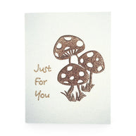Handmade by Erika Liesel Just For You card featuring a whimsical sparkly brown glitter mushroom design on white paper.