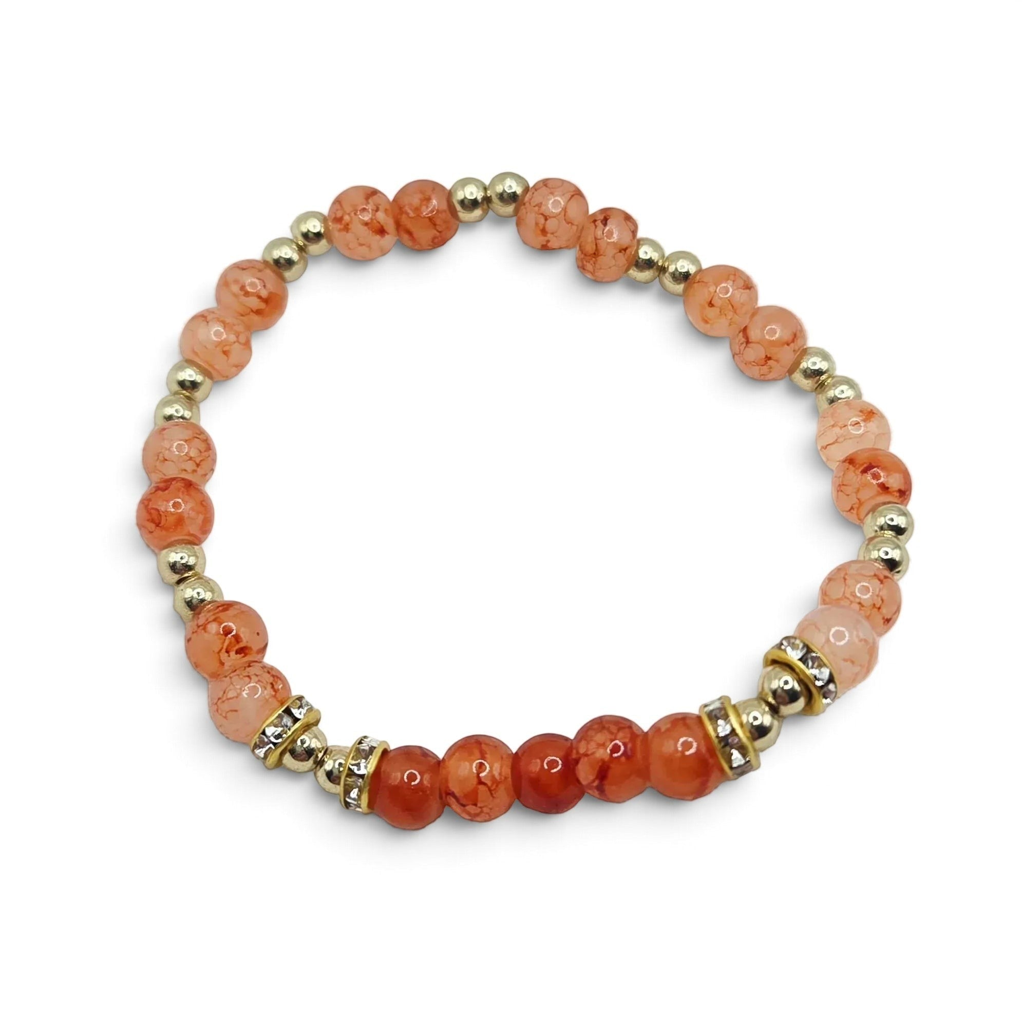 Handmade by Erika Liesel Sunset Ember stretch bracelet with peach, coral, and orange glass beads and gold accents.