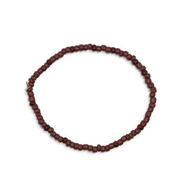 Handmade by Erika Liesel Clay bracelet featuring minimalist terracotta glass beads on a durable stretch cord.
