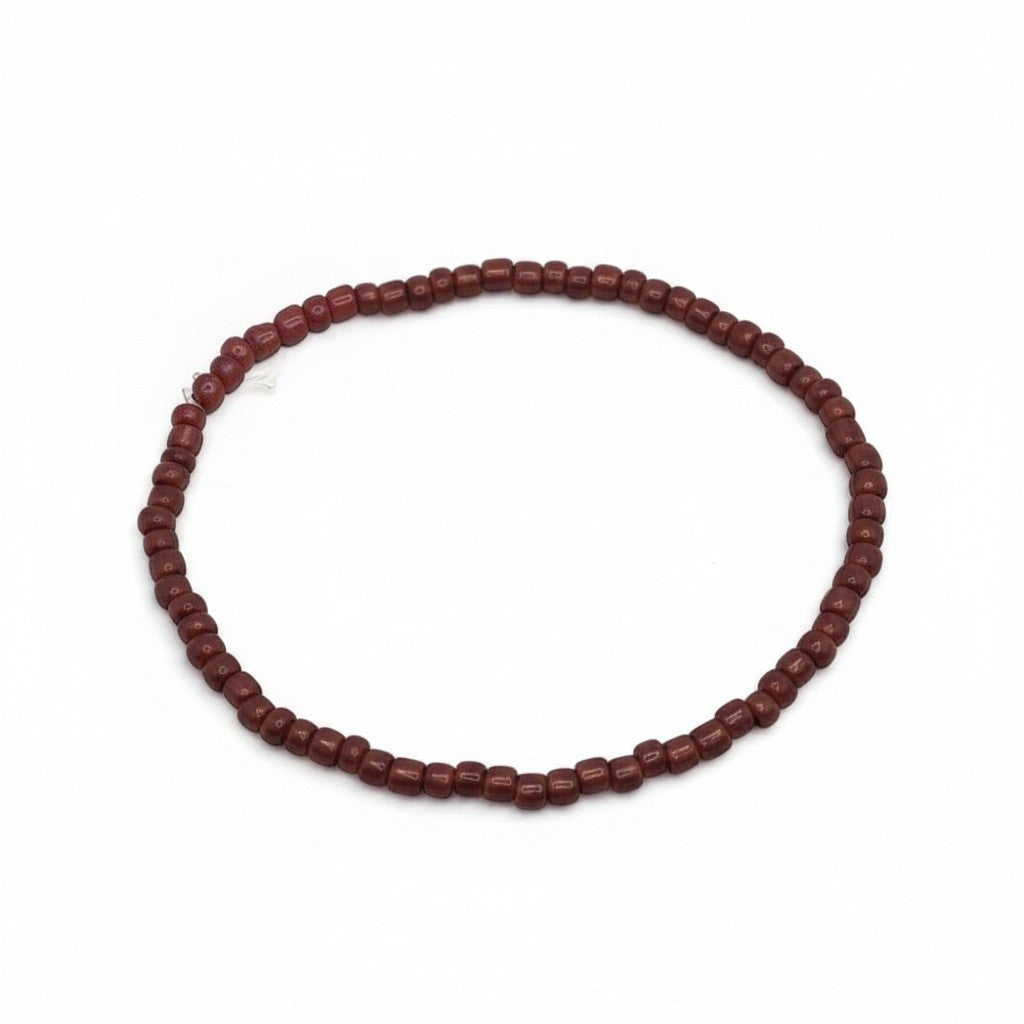 Handmade by Erika Liesel Clay bracelet featuring small terracotta glass beads with a silver-tone clasp
