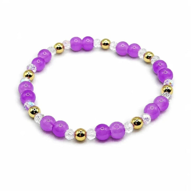 Handmade by Erika Liesel violet stretch bracelet with purple glass beads, clear crystals, and 18K gold-plated accents.