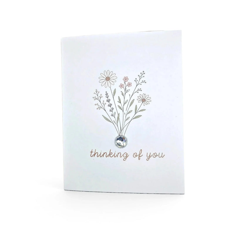 Handmade by Erika Liesel greeting card with wildflower illustration, gemstone accent, and thinking of you text.
