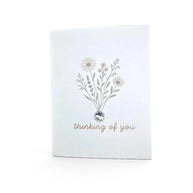 Handmade by Erika Liesel greeting card with wildflower illustration, gemstone accent, and thinking of you text.