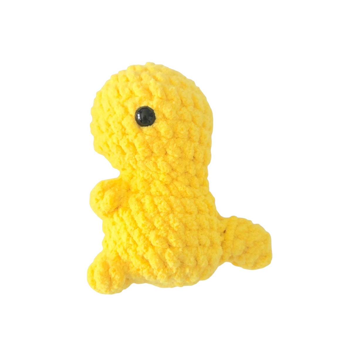 Handmade by Erika Liesel yellow crochet dinosaur plushie made from soft chenille yarn with a black safety eye.