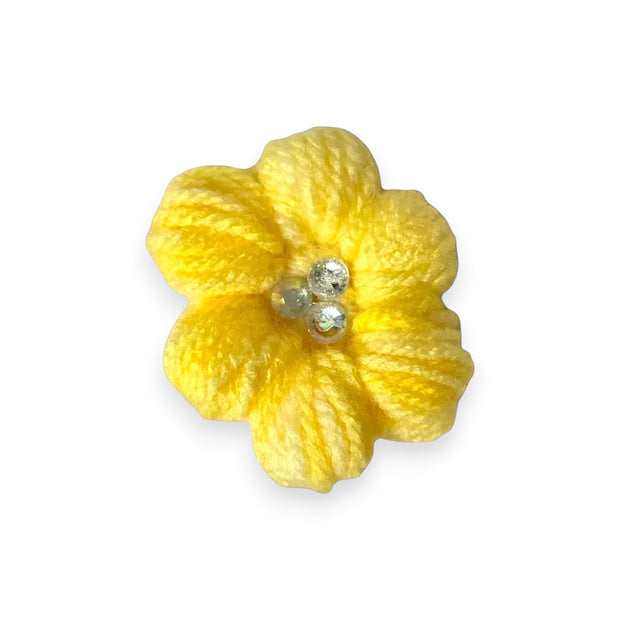 Handmade yellow crochet flower with sparkling bead center, cozy craft gift