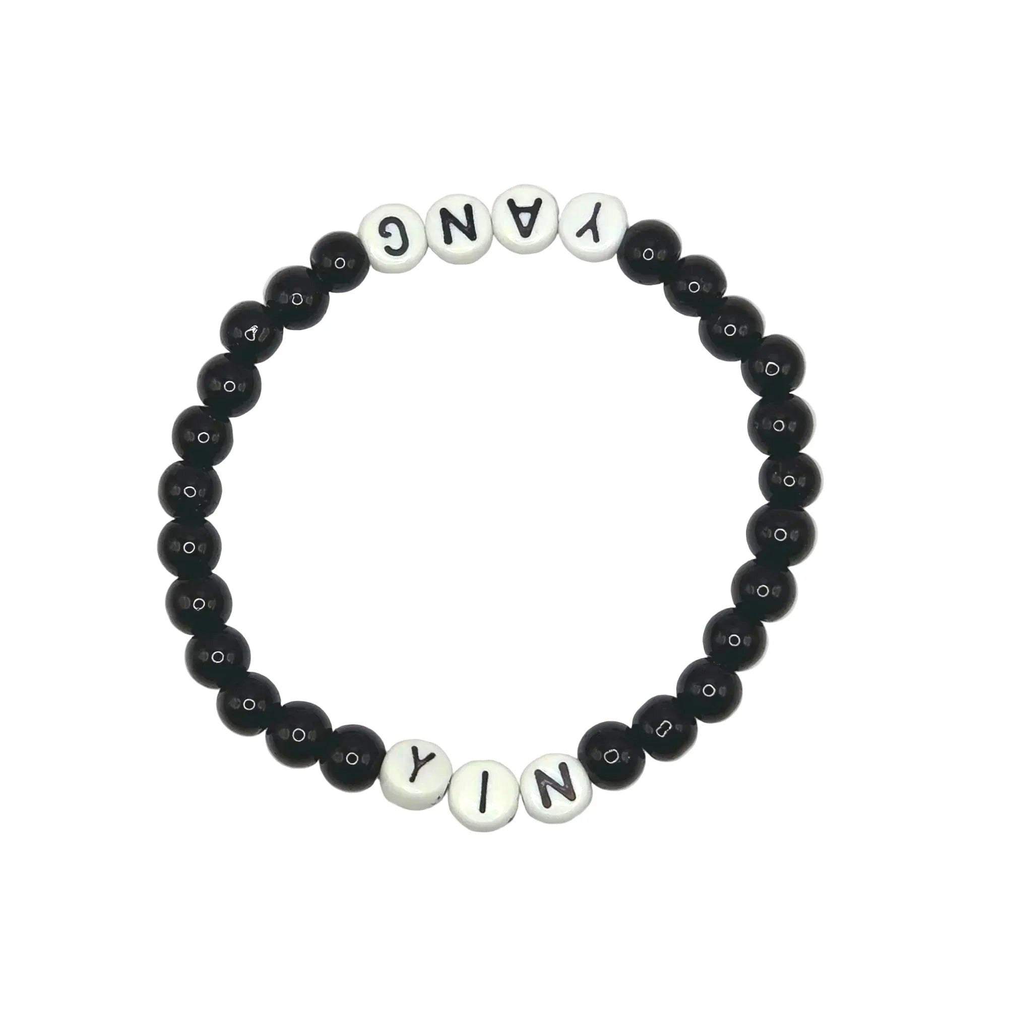 Handmade by Erika Liesel stretch bracelet with black glass beads and white letter beads spelling Yin and Yang