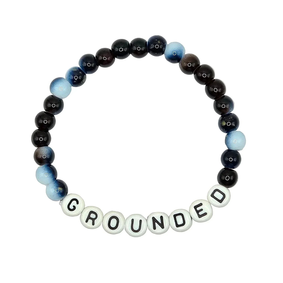 A beaded stretch bracelet on a light gray background, featuring dark brown and black beads, light blue and white marbled beads, and white letter beads spelling 'GROUNDED'.