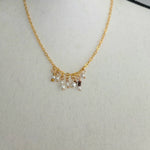 Gold chain necklace with pearl and bead charms, handmade delicate jewelry for everyday wear