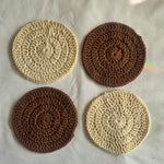 Handmade crochet coasters in cream and brown, cozy home decor for coffee or tea
