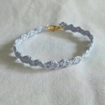 Handmade crochet bracelet in soft blue with gold clasp, perfect cozy gift for everyday wear