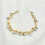 Handmade gold and silver chain bracelet with pearl accents, perfect for everyday wear or gifting.