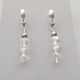 Handmade by Erika Liesel silver crystal half-hoop drop earrings with round beads and a polished silver-tone finish.