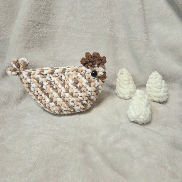 Handmade crochet chicken with eggs, cozy and creative amigurumi design