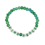 A beaded stretch bracelet featuring green and blue marbled beads with white letter beads spelling 'FIND PEACE' on a light gray background.