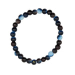 A beaded stretch bracelet made of round polished beads in shades of dark brown, black, and blue, arranged in a circle on a plain white background.