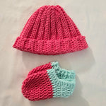 Handmade crochet baby hat and booties set in pink and mint, cozy newborn gift