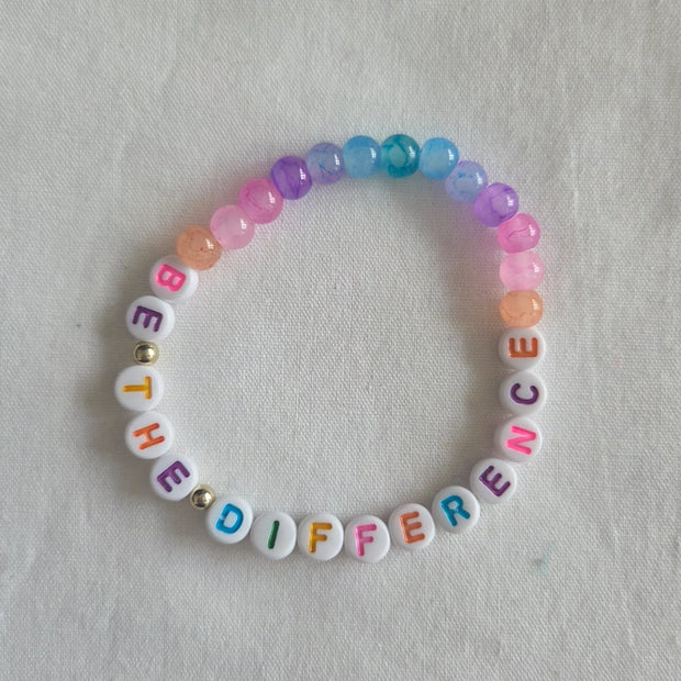 Colorful beaded bracelet with 'BE THE DIFFERENCE' message, handmade with vibrant beads