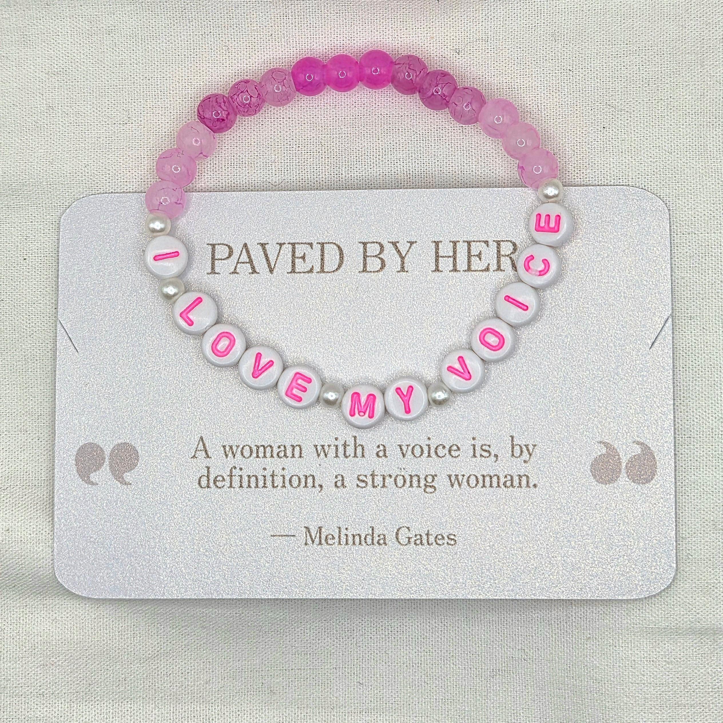 Pink and white beaded bracelet with 'LOVE MY VOICE' letter beads, displayed on a card with empowering quote.