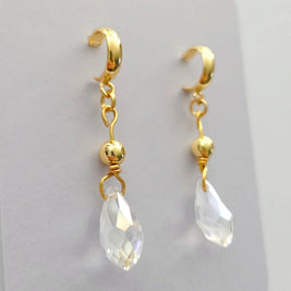 Handmade by Erika Liesel gold half-hoop drop earrings featuring faceted clear crystal beads and 18k gold accents.
