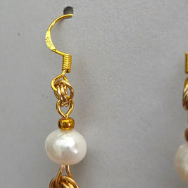 Handmade by Erika Liesel gold freshwater pearl drop earrings with delicate chain and linked sterling silver rings