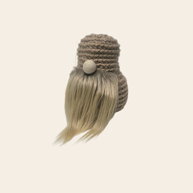 Handmade crochet gnome with blonde hair and wooden button, cozy home decor